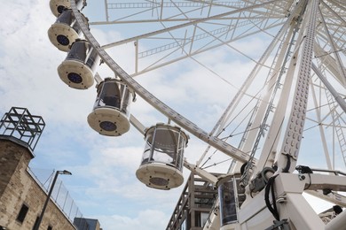 Photo of Picturesque view of beautiful Ferris wheel in city