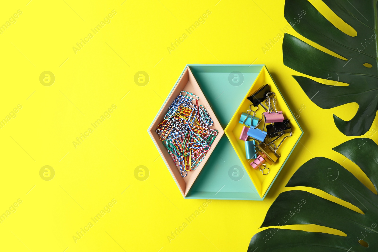 Photo of Stylish tray with office stationery on color background. Space for text