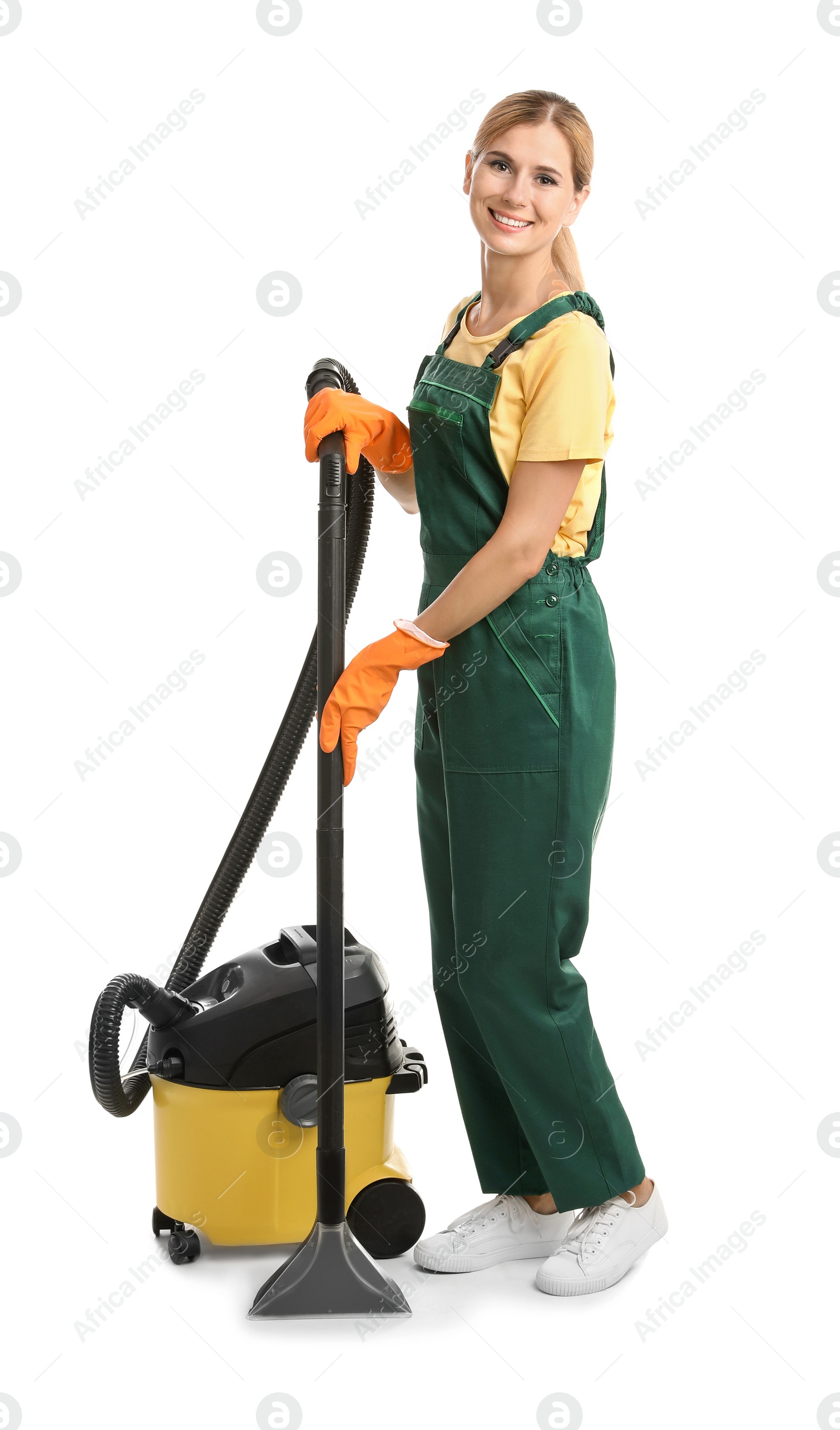 Photo of Female janitor with carpet cleaner on white background