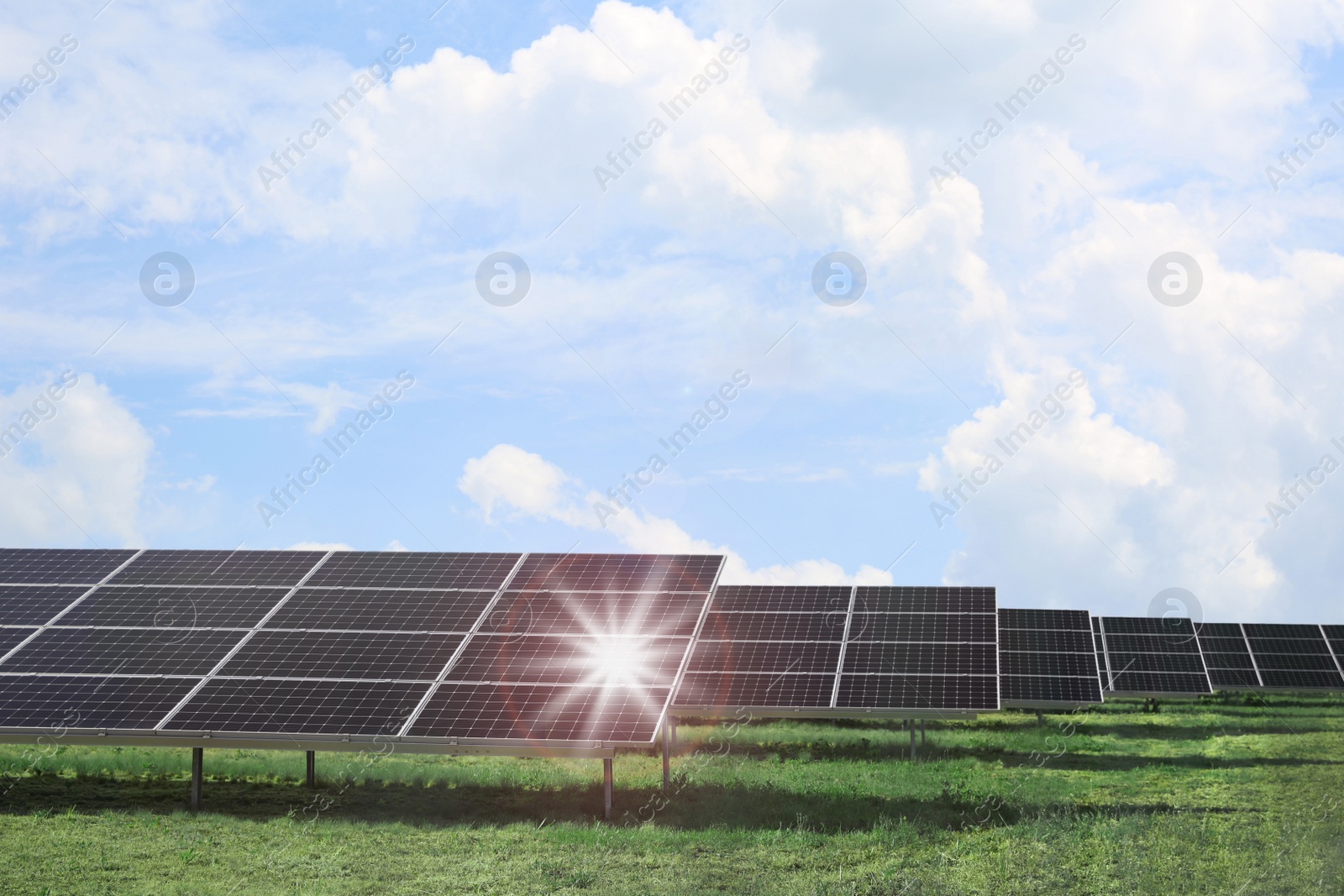 Photo of Solar panels installed outdoors. Alternative energy source