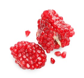 Fresh ripe pomegranate seeds isolated on white, top view