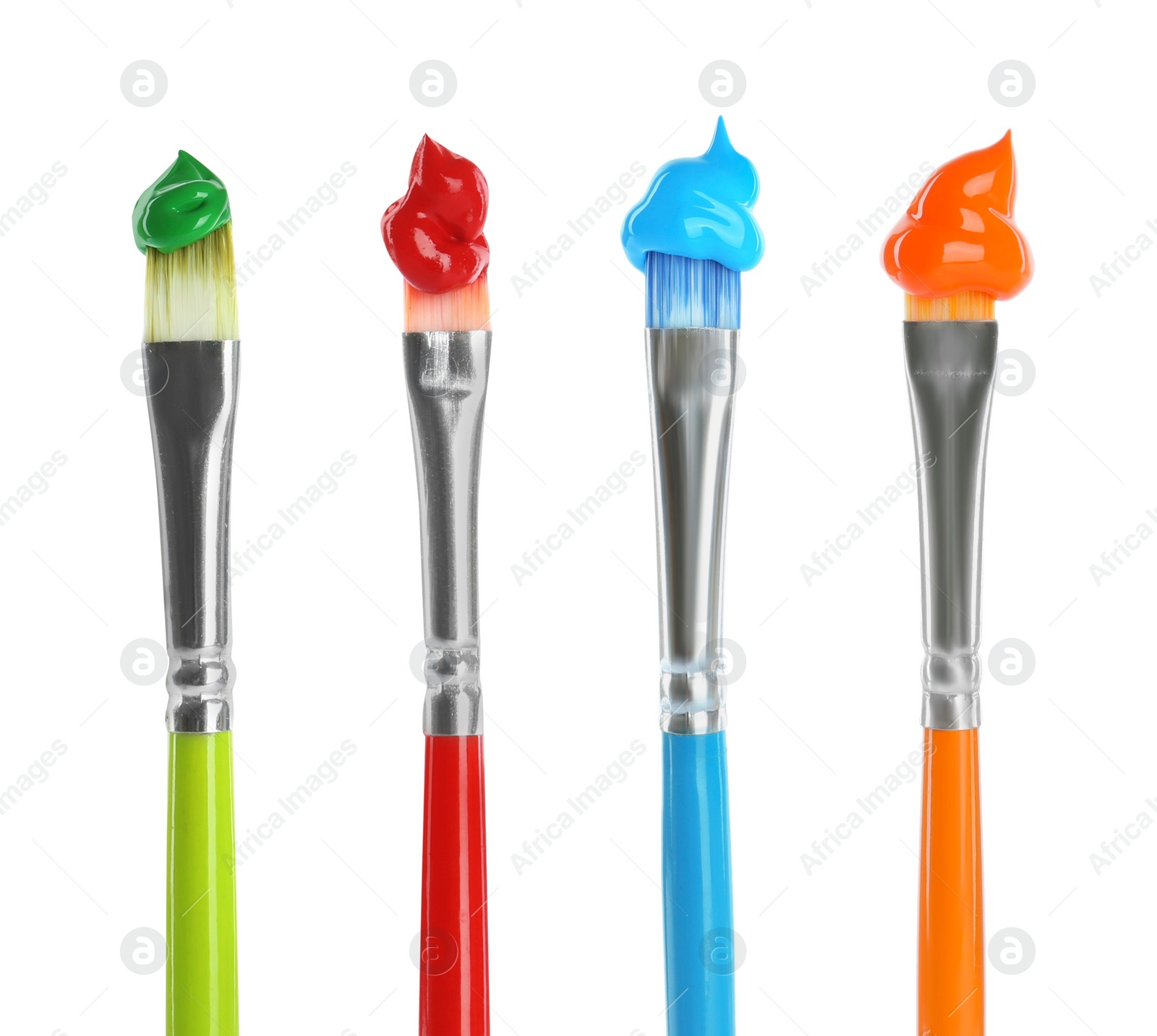 Image of Set of different brushes with paints on white background