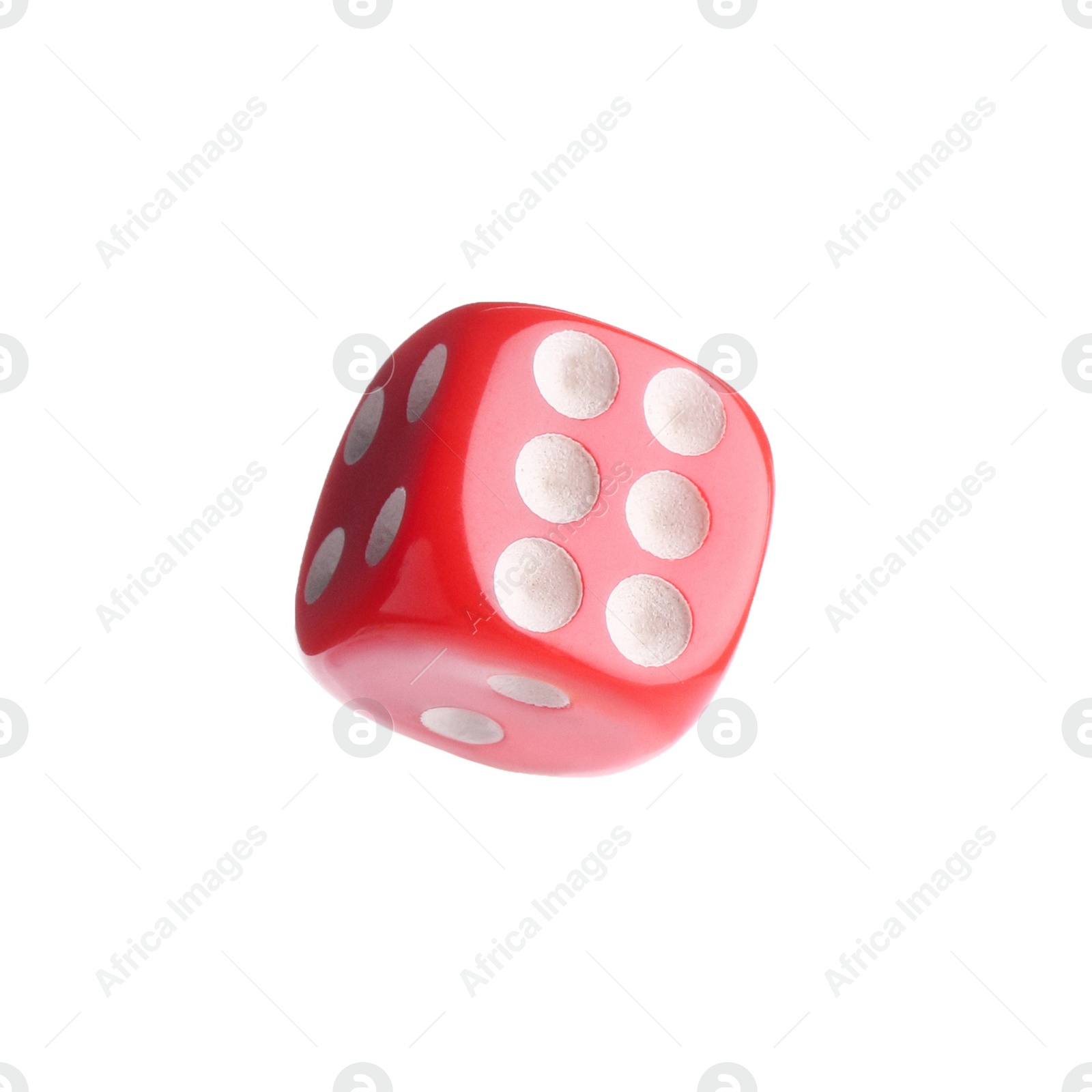 Photo of One red game dice isolated on white