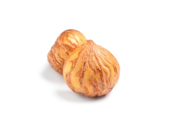 Photo of Fresh shelled sweet edible chestnuts on white background