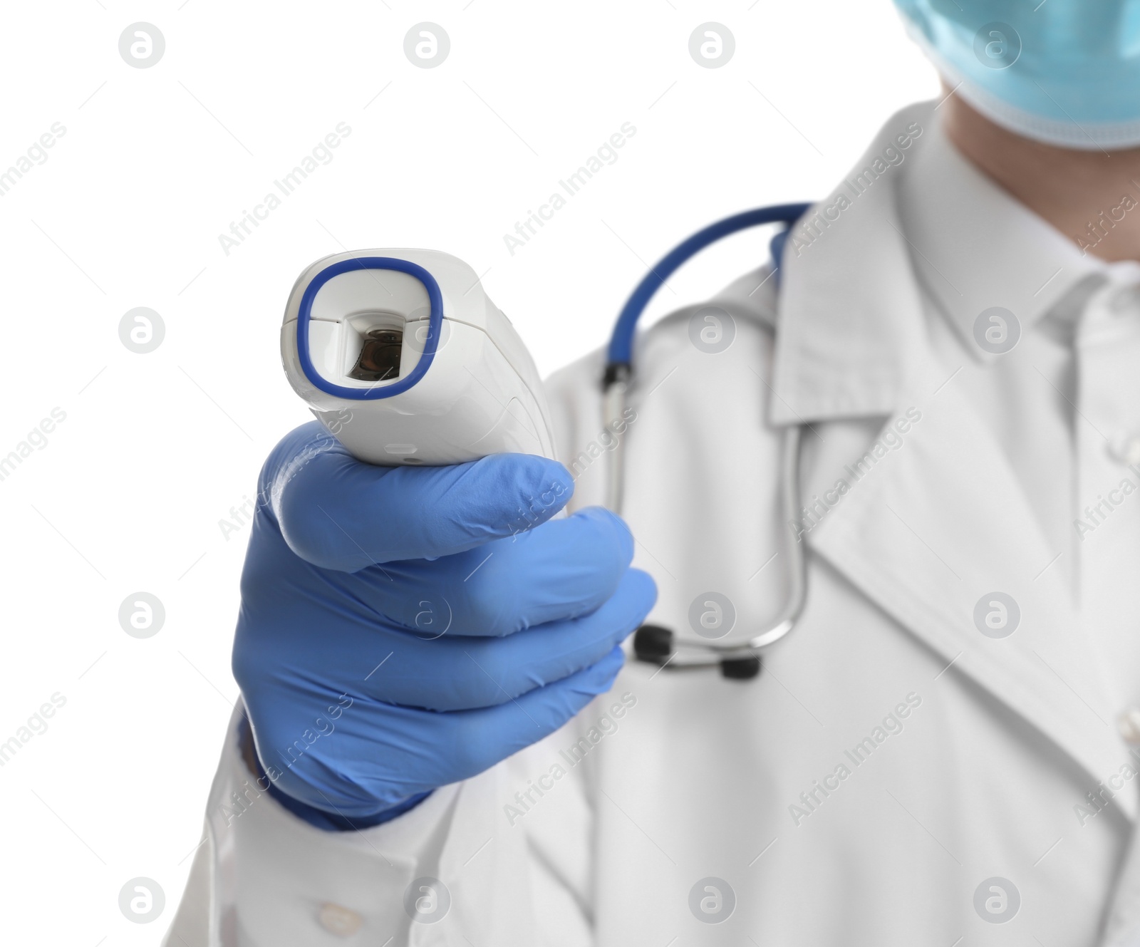 Photo of Doctor in latex gloves holding non contact infrared thermometer on white background, closeup. Measuring temperature