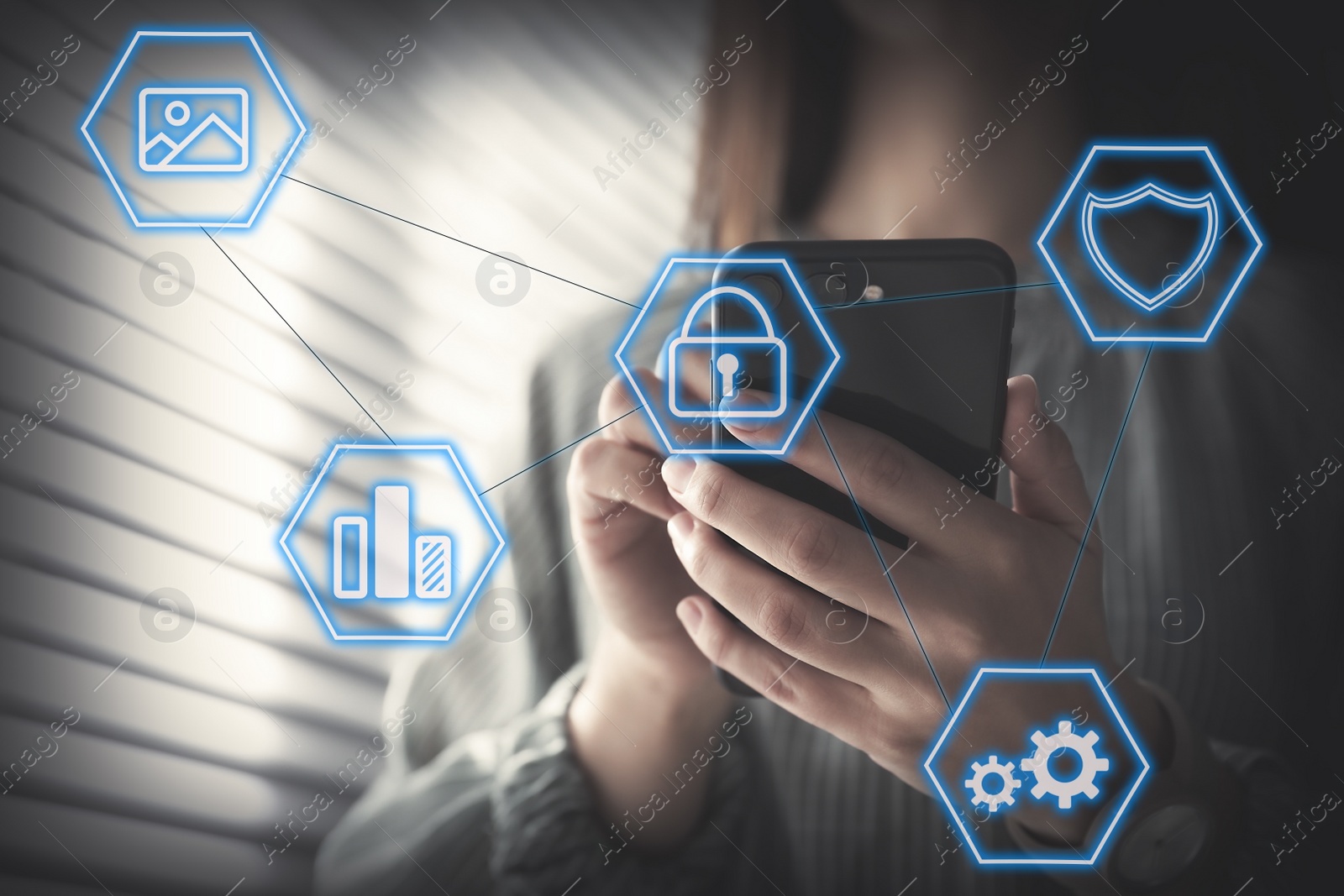 Image of Information security. Young woman using smartphone indoors, closeup