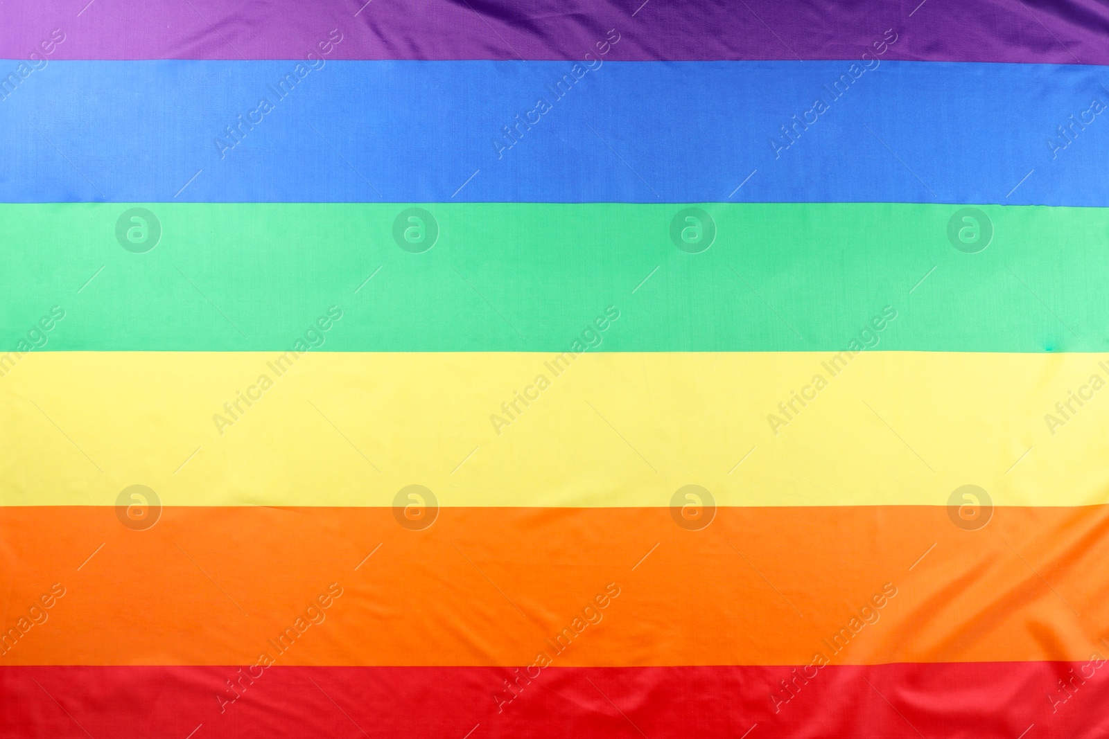 Photo of Rainbow LGBT flag as background, top view