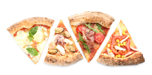 Photo of Slices of different delicious pizzas on white background, top view