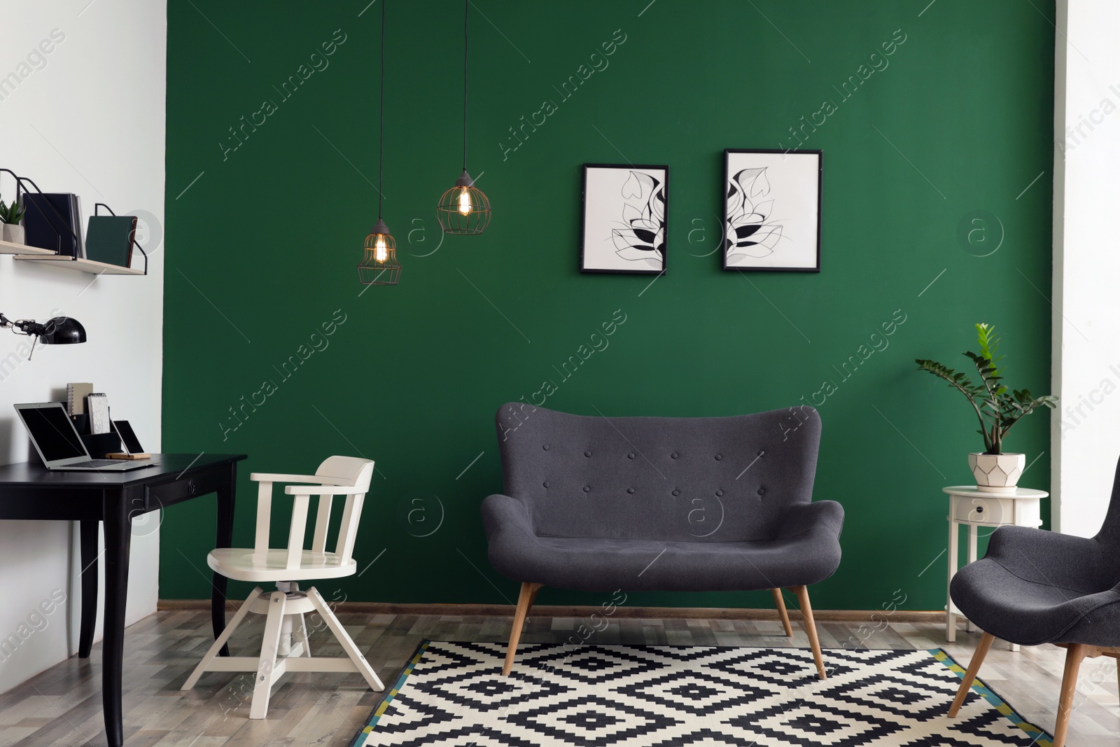 Photo of Modern living room interior stylish sofa near green wall