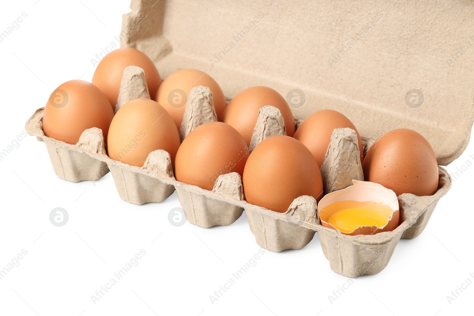 Photo of Chicken eggs in carton isolated on white