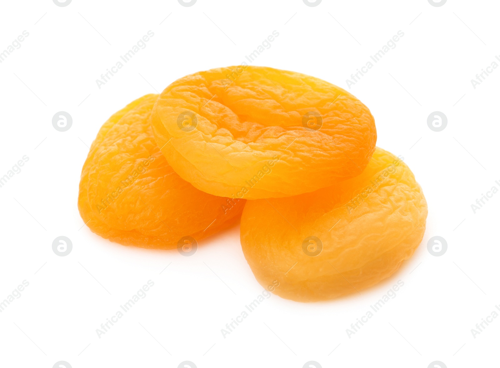 Photo of Tasty apricots on white background. Dried fruits