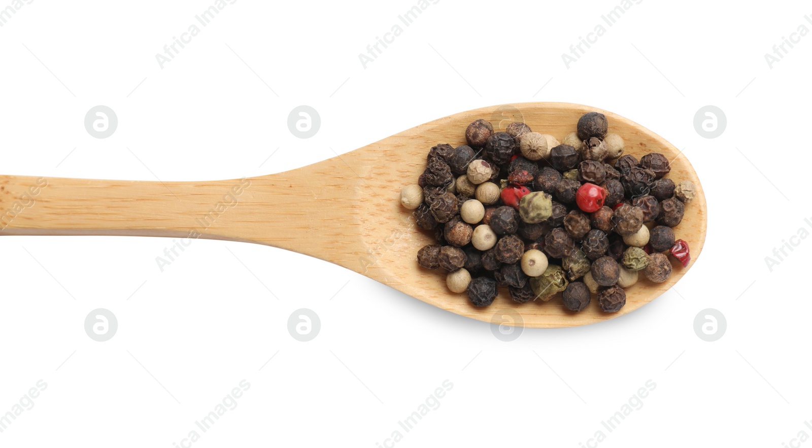 Photo of Aromatic spices. Different peppers in wooden spoon isolated on white, top view