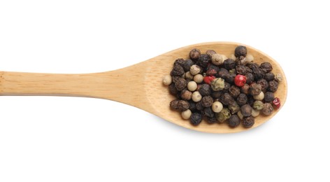 Aromatic spices. Different peppers in wooden spoon isolated on white, top view