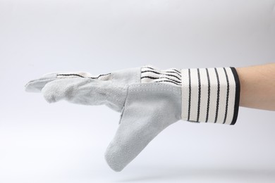 Woman in gardening glove on white background, closeup