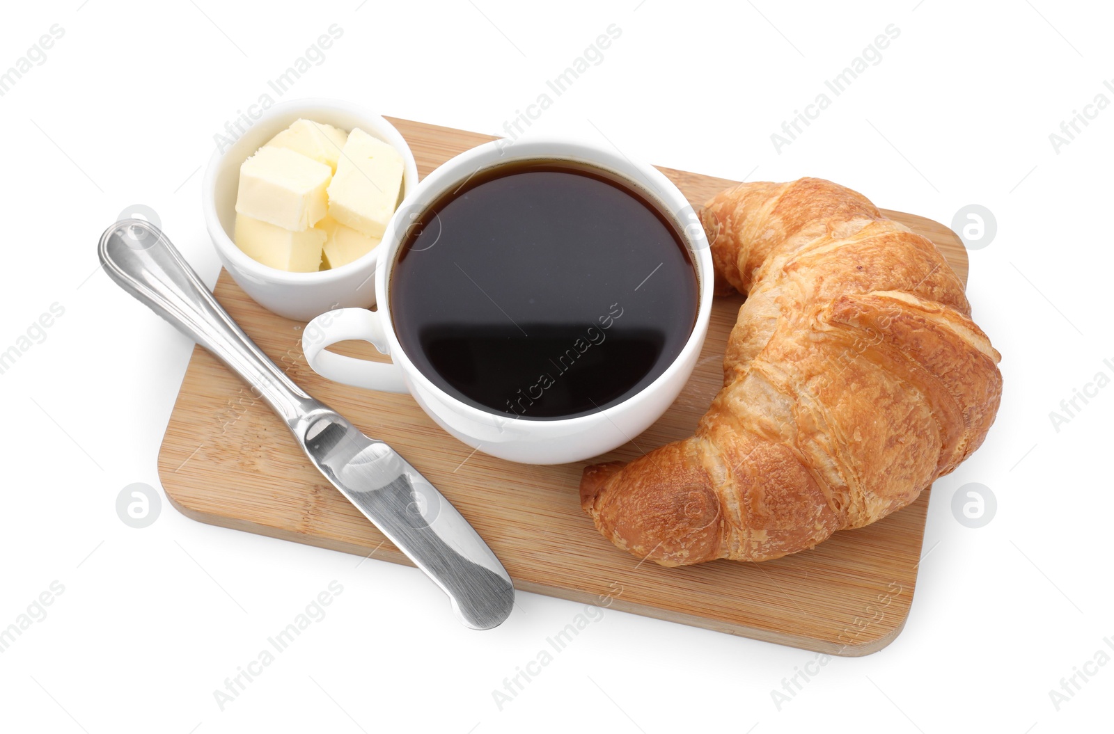 Photo of Fresh croissant, butter and coffee isolated on white, above view. Tasty breakfast