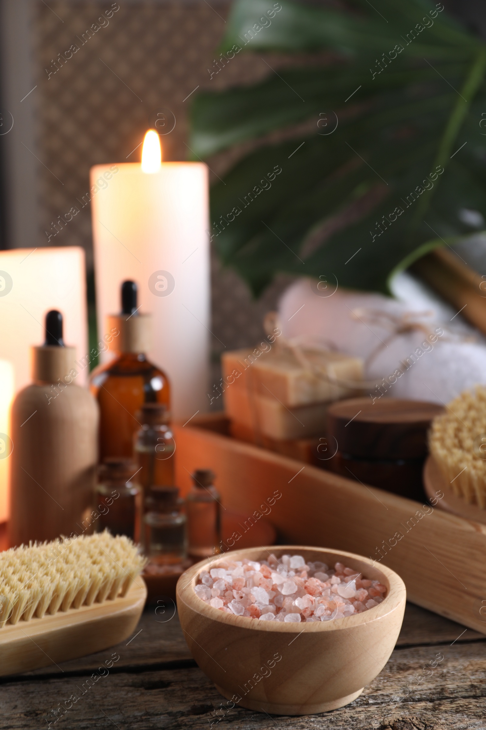 Photo of Composition with different spa products on wooden table