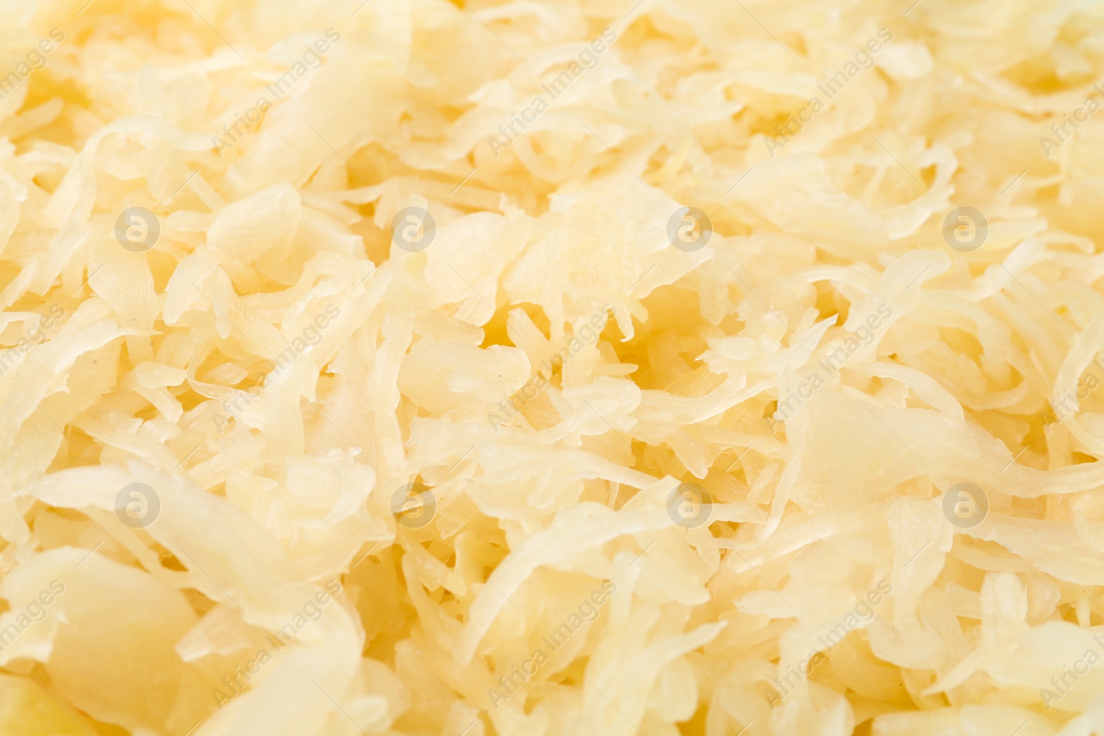 Photo of Tasty fermented cabbage as background, closeup view