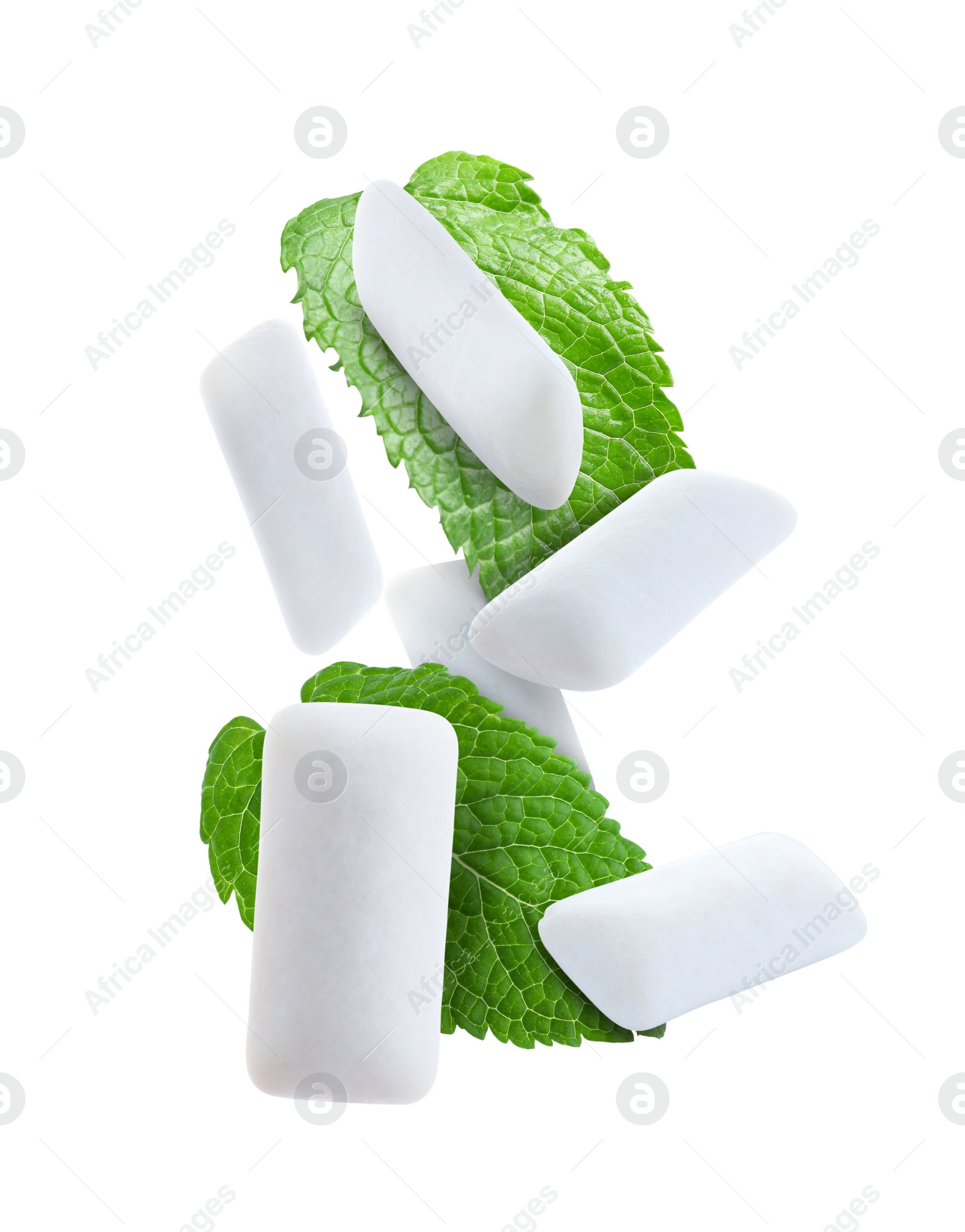 Image of Fresh mint leaves and chewing gum pads falling on white background