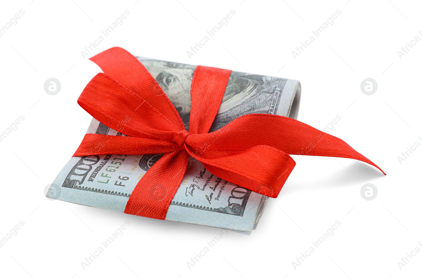 Photo of Dollar banknotes with red ribbon isolated on white