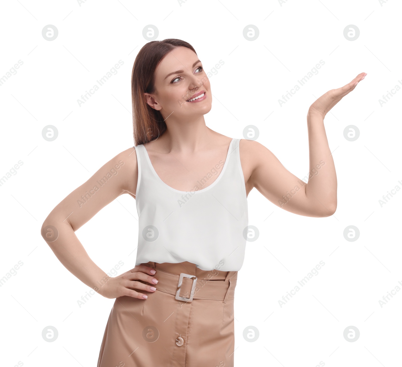 Photo of Beautiful happy businesswoman pointing at something on white background