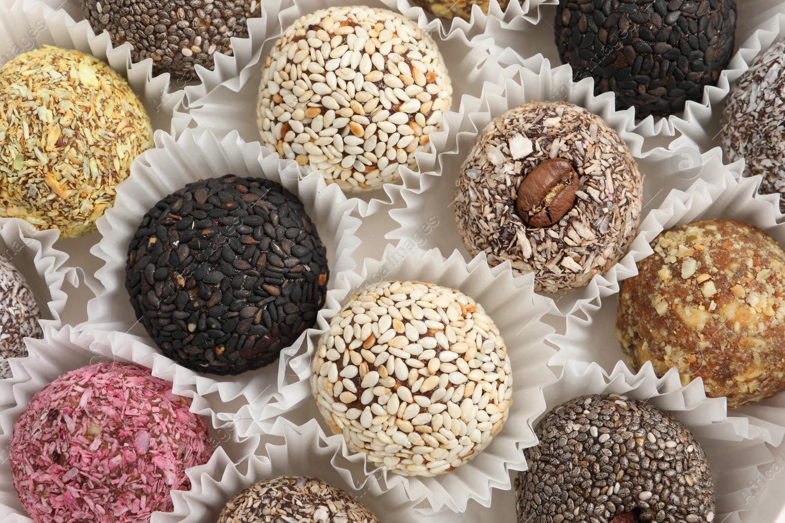 Photo of Assortment of different delicious vegan candy balls, top view