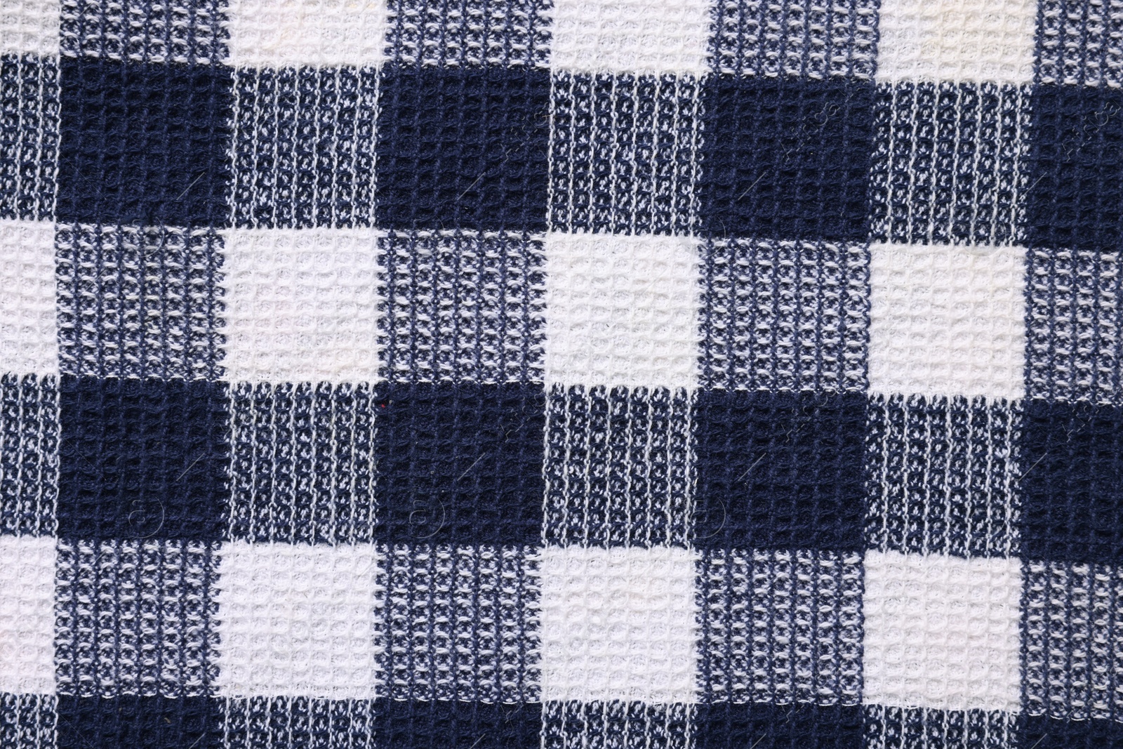 Photo of Texture of checkered fabric as background, top view