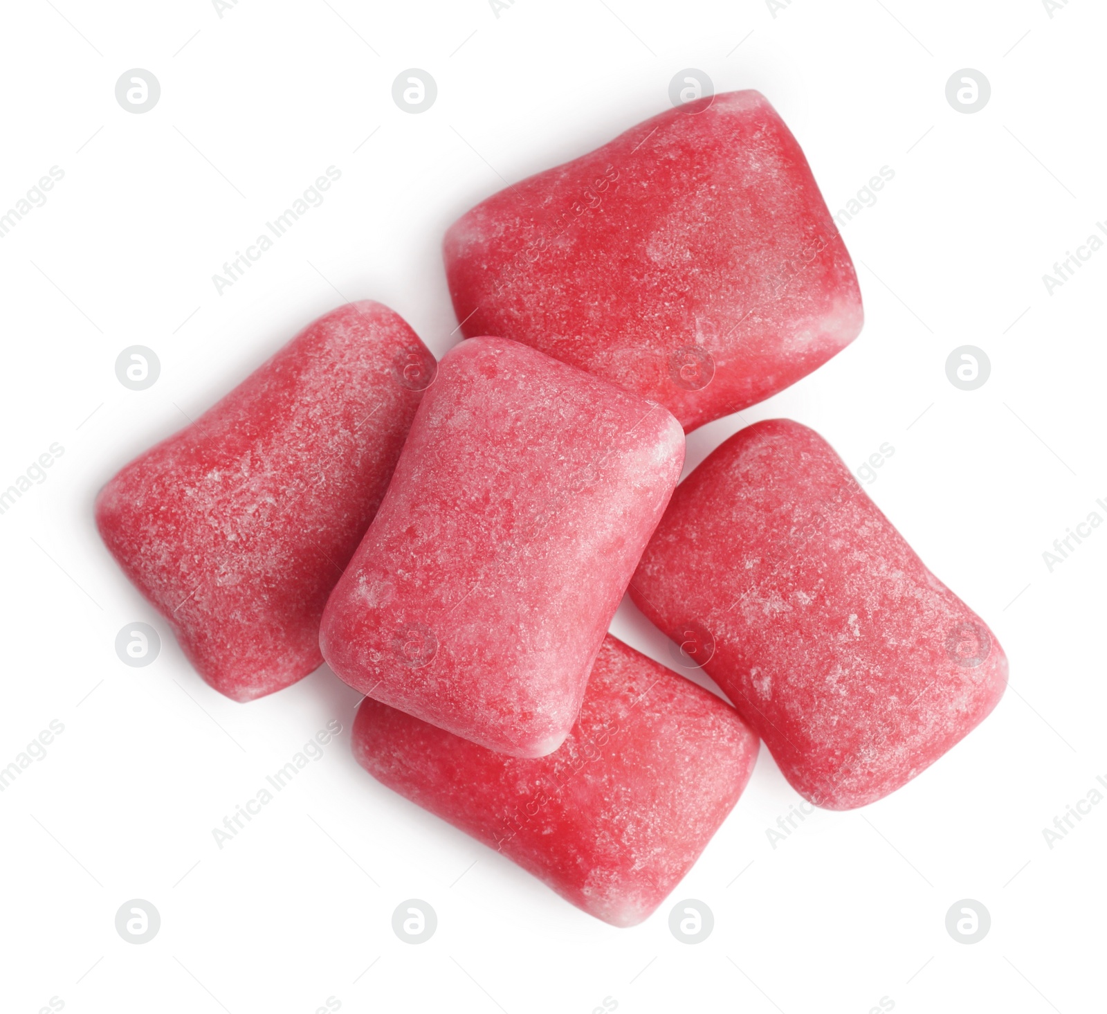 Photo of Heap of tasty sweet chewing gums on white background, top view