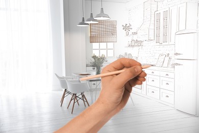 Image of Woman drawing kitchen interior design, closeup. Combination of photo and sketch