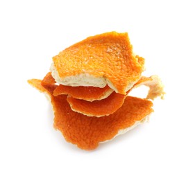 Photo of Dry orange fruit peels on white background