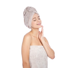 Photo of Portrait of young pretty woman with towels on white background