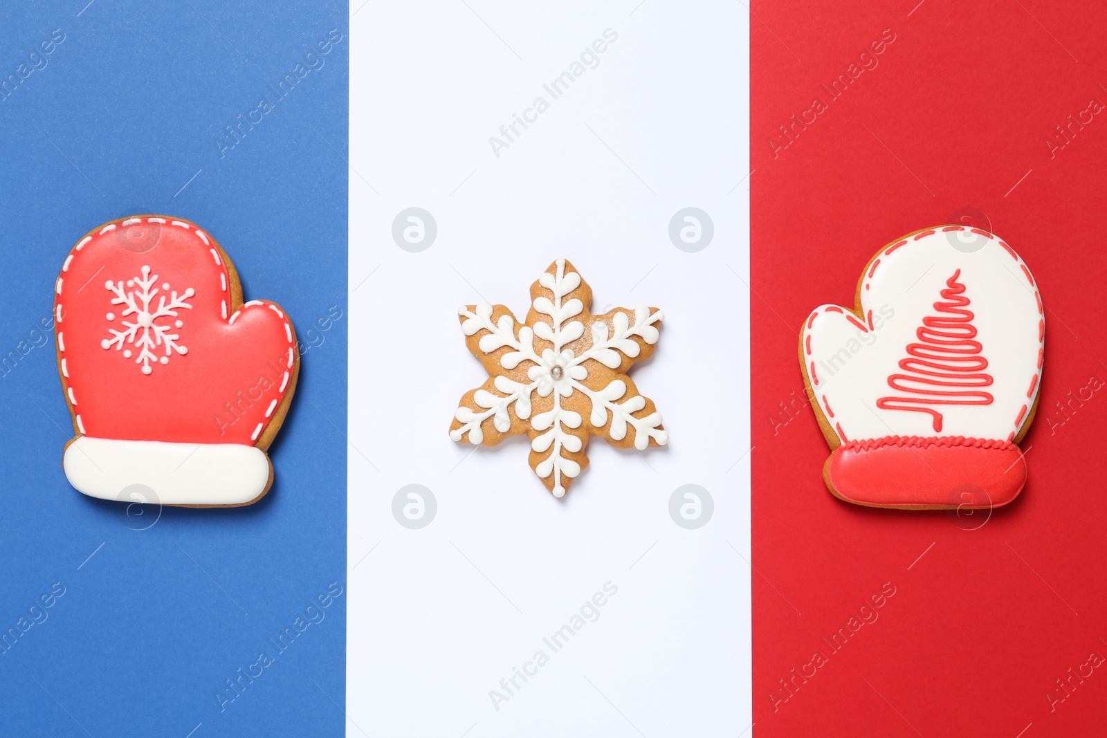 Photo of Tasty homemade Christmas cookies on color background, flat lay