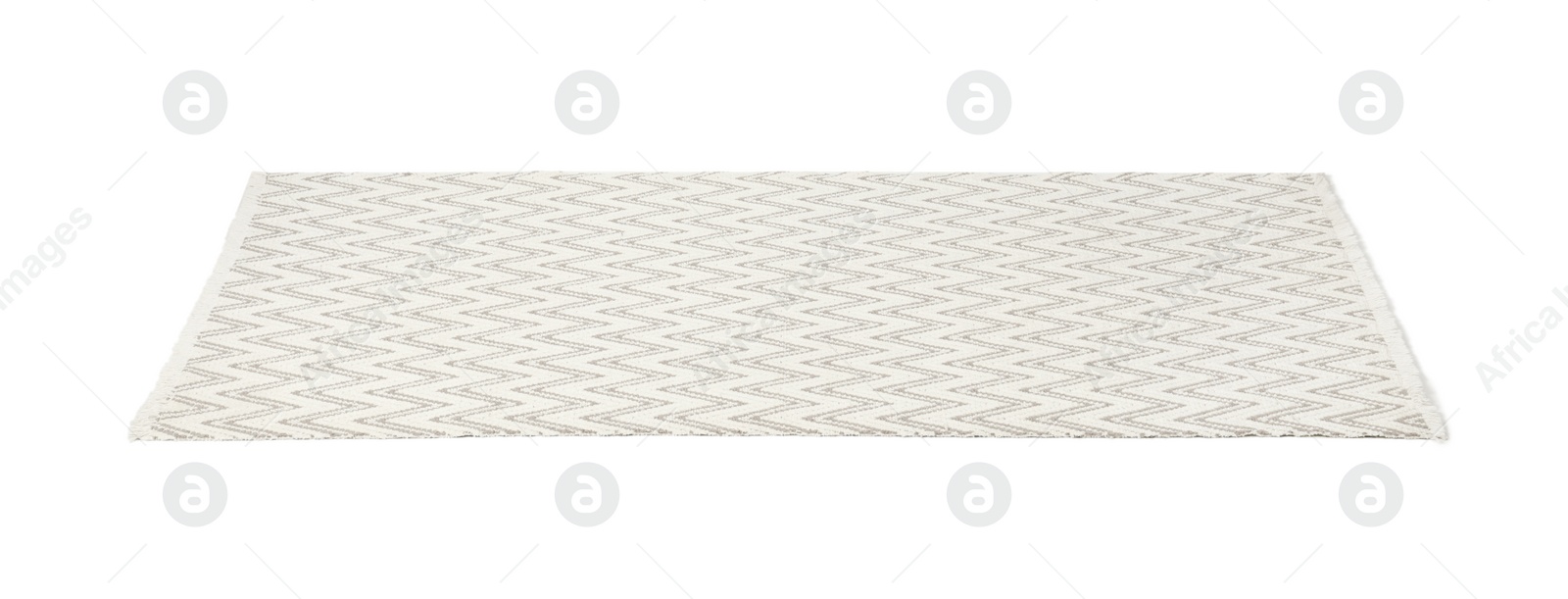 Photo of Light carpet with geometric pattern isolated on white
