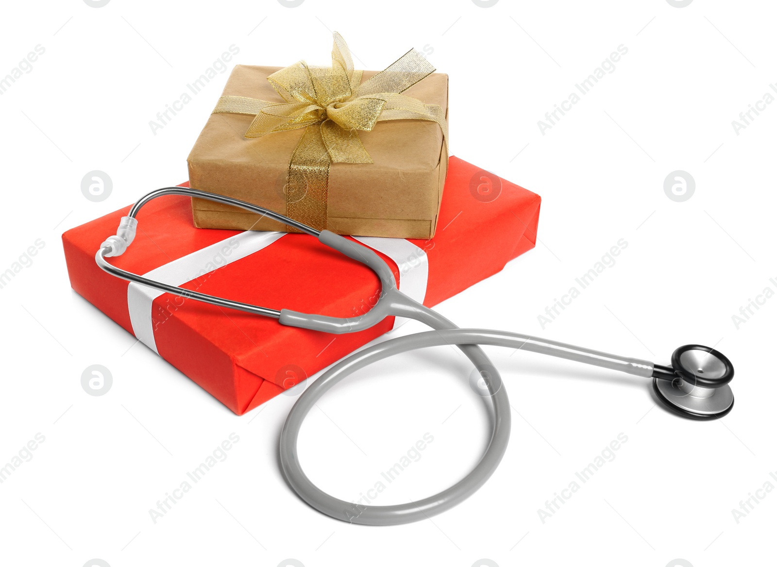 Photo of Stethoscope and gift boxes on white background. Happy Doctor's Day