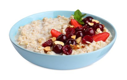Photo of Bowl of oatmeal porridge with berries isolated on white