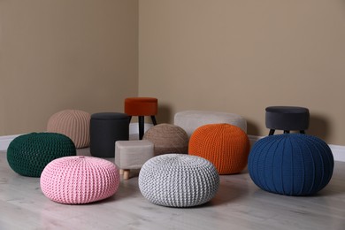 Photo of Stylish comfortable poufs in room. Home design