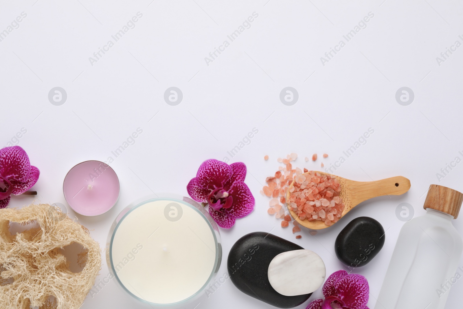 Photo of Flat lay composition with different spa products on white background, space for text