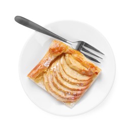Photo of Plate with piece of delicious apple pie and fork isolated on white, top view