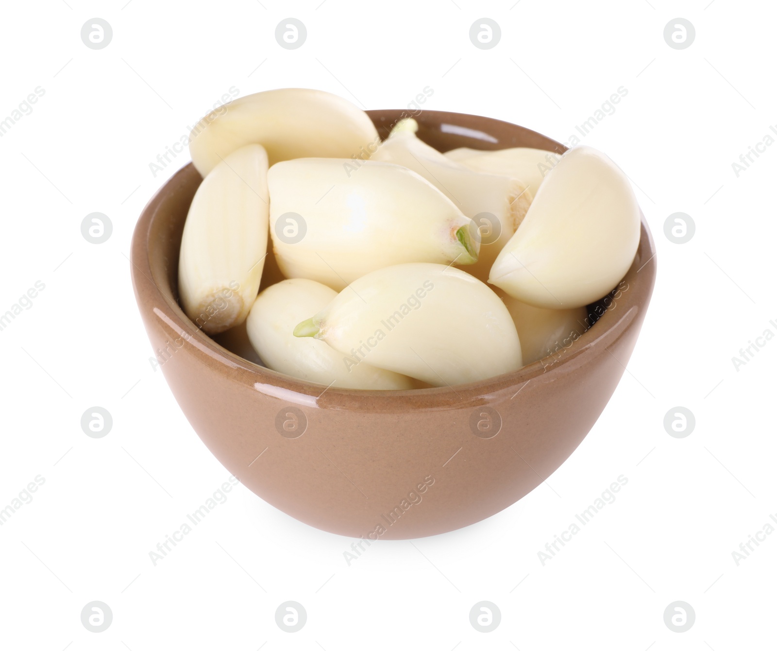 Photo of Peeled cloves of fresh garlic in bowl isolated on white