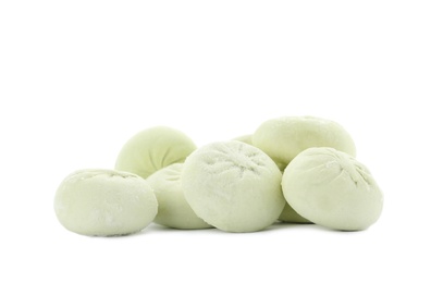 Photo of Heap of raw dumplings with tasty filling on white background