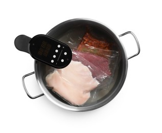 Photo of Thermal immersion circulator and meat in pot on white background, top view. Vacuum packing for sous vide cooking