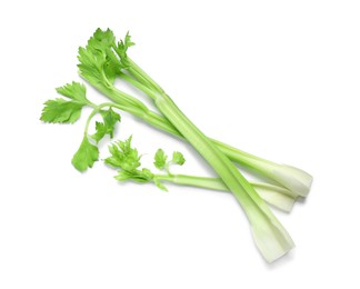 Photo of Fresh stalks of celery isolated on white, top view