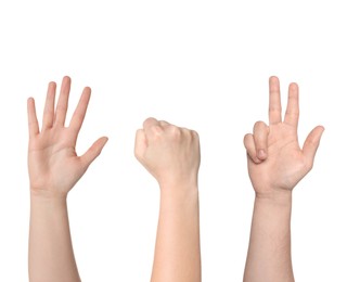 Image of People playing rock, paper and scissors on white background, closeup