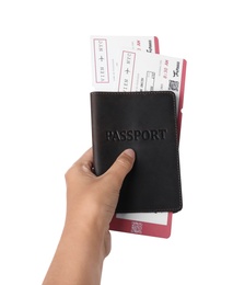 Photo of Woman holding passport with tickets on white background, closeup. Travel agency concept