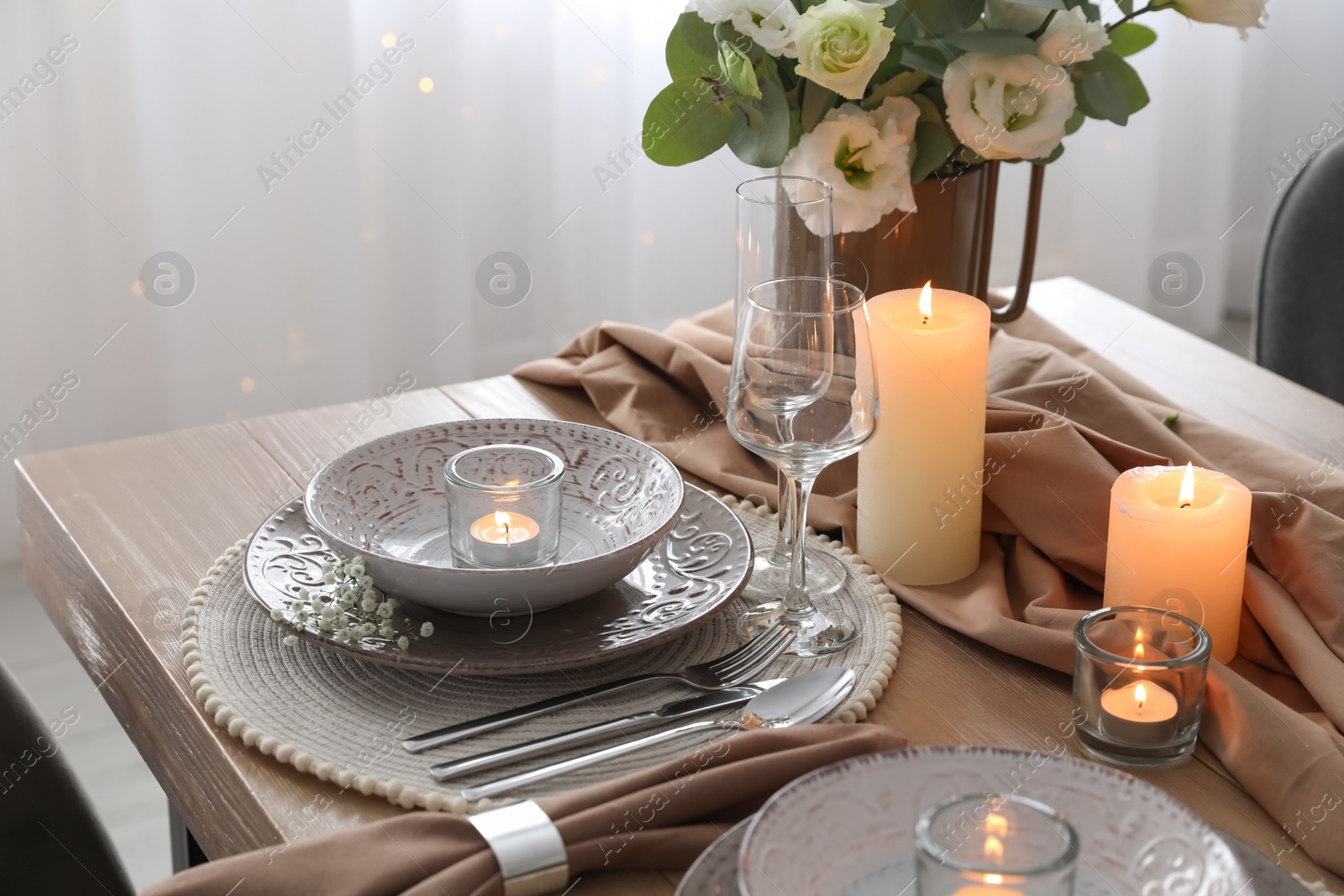 Photo of Festive table setting with beautiful floral decor in restaurant