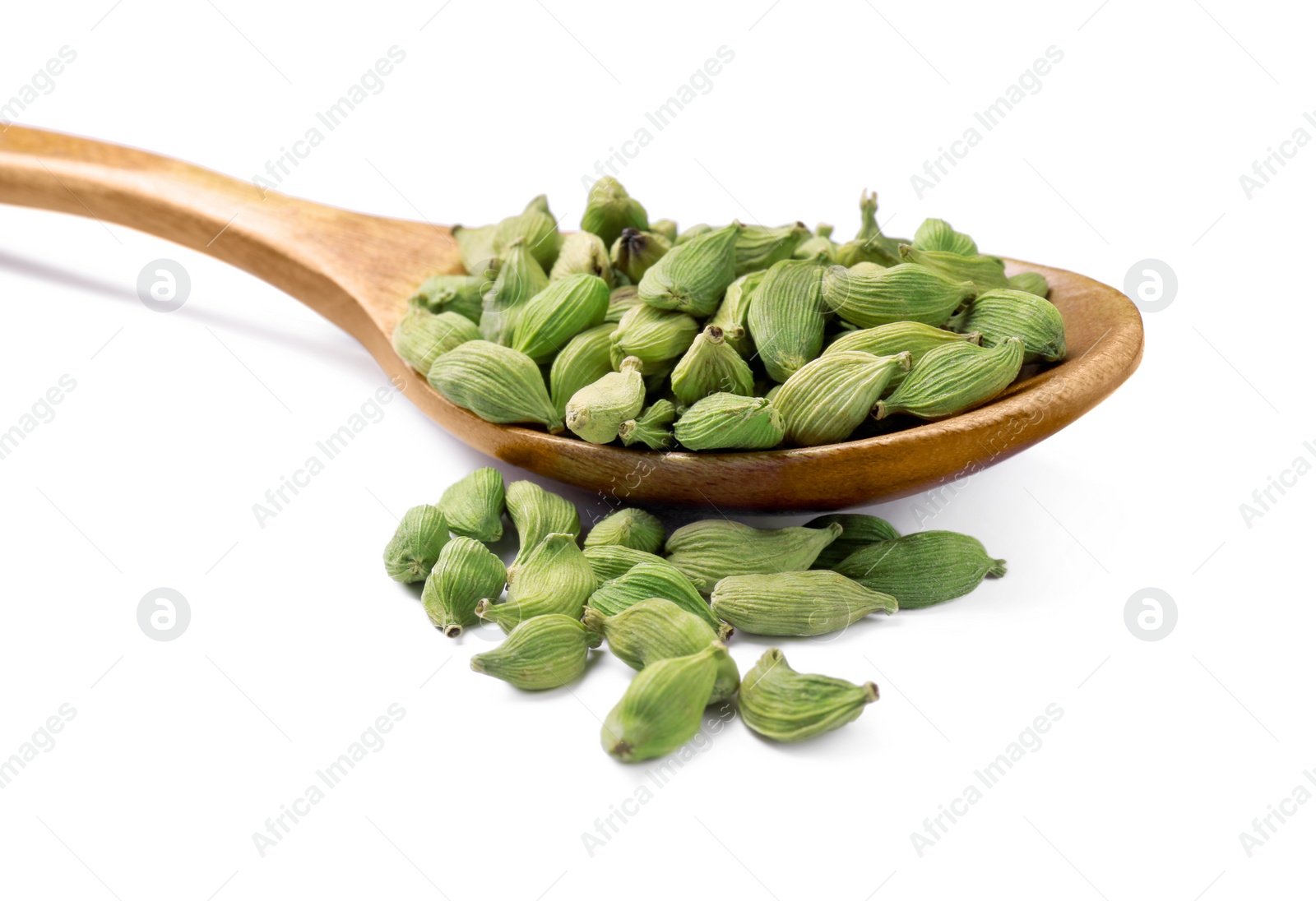 Photo of Wooden spoon with cardamom on white background, closeup