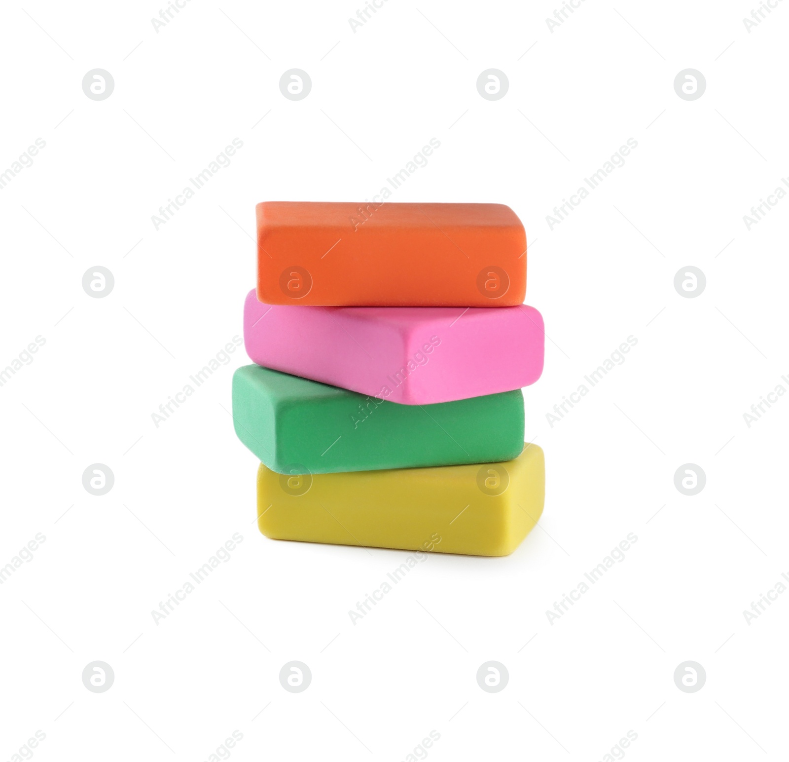 Photo of Stack of bright erasers on white background