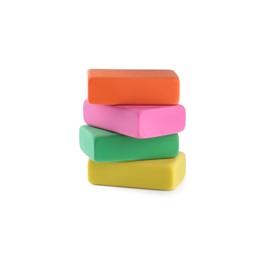 Photo of Stack of bright erasers on white background