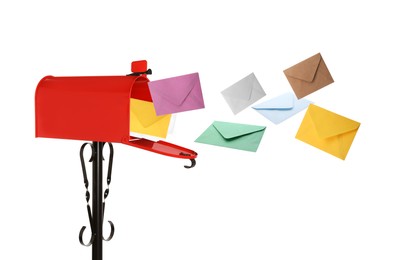 Different color envelopes flying out from red letter box on white background