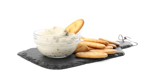 Photo of Delicious crackers and humus on white background