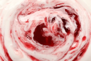 Photo of Tasty yogurt with jam as background, top view